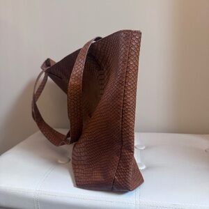Bloomingdale’s Exclusive faux snakeskin tote bag in brown
